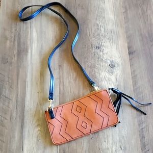 INC cross body bag. Tan and black.